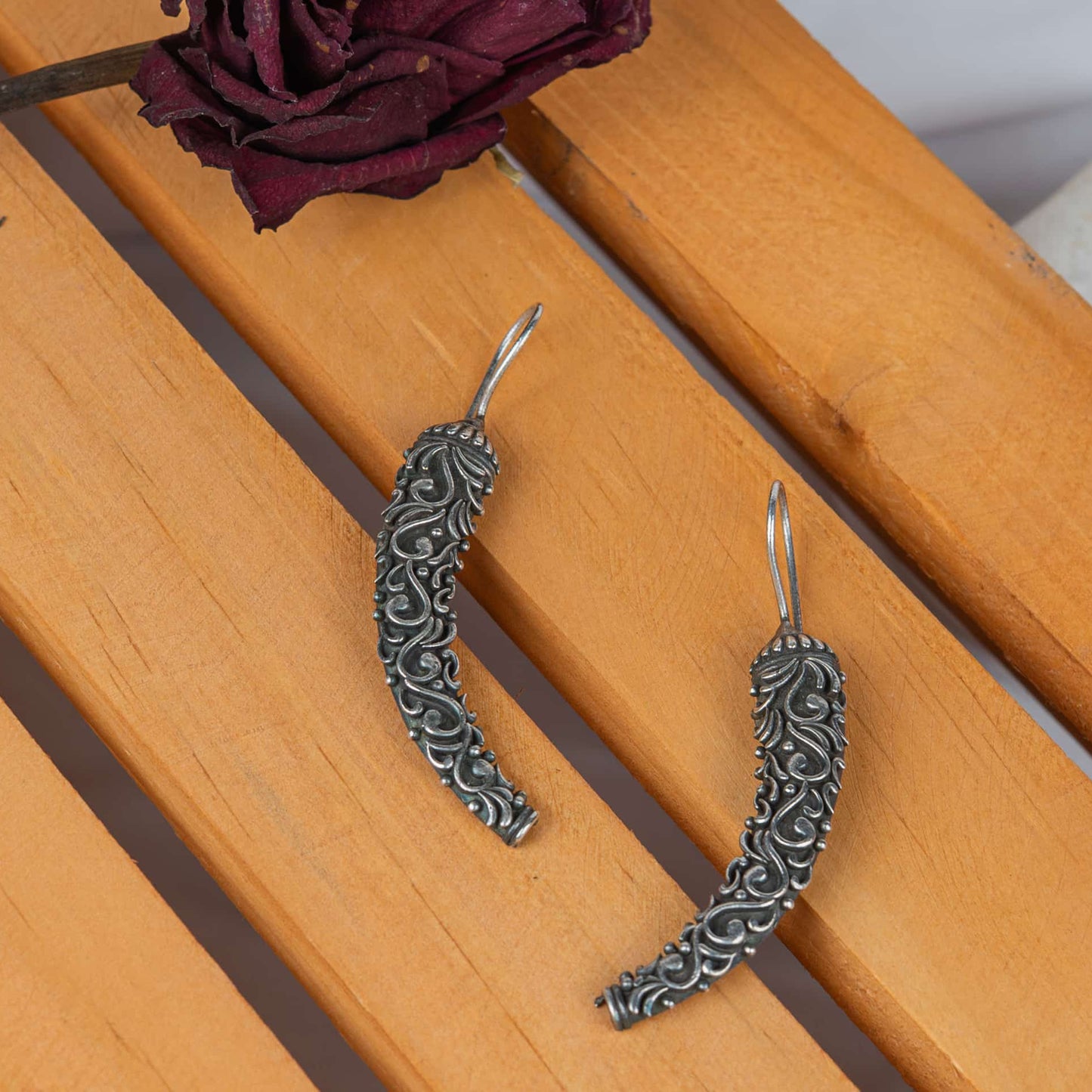German Silver Mirchi Earring with Intricate Floral Engraving