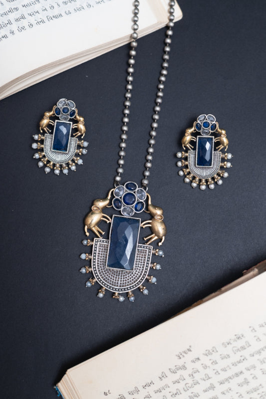 Grand Silver & Gold Ruby Pendant Set with Elephant Motifs and Beaded Chain