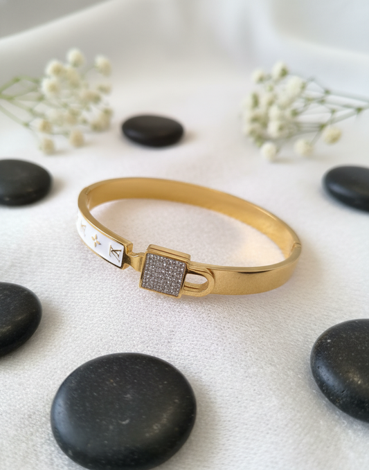 Elegant Padlock Charm Bangle with White Enamel Accents