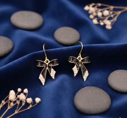 Glimmering Noir Bow Drop Earrings