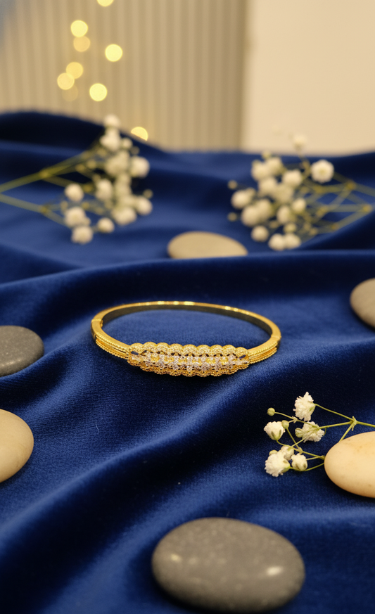 Elegant Golden Bangle with Intricate Pave Setting