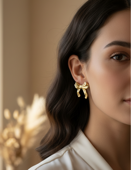 "Chic Bow" Gold Tone Stud Earrings